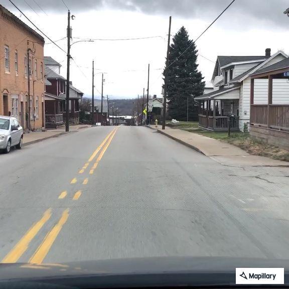 Vehicle hits pole, driver trapped in Connellsville