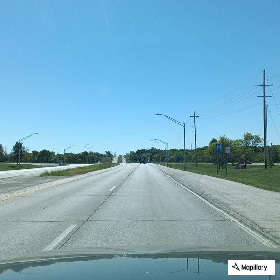 Driver reports white truck weaving on Highway 63