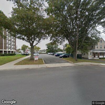 Person experiencing severe back pain near Long Branch