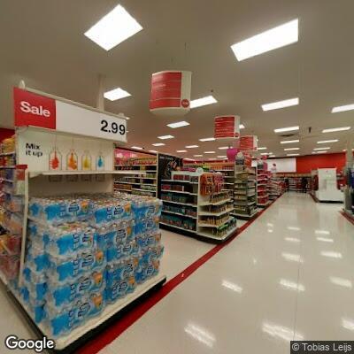 Man concealing items in Target loss prevention office