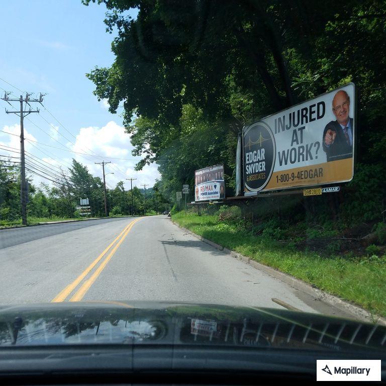 Woman falls off bike and hits ribs on guardrail near Hickory Street