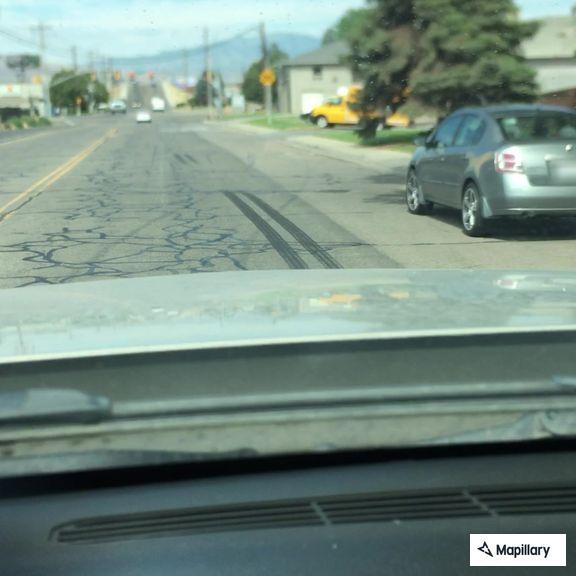 Person treated for dog scratches at 900 W 200 S