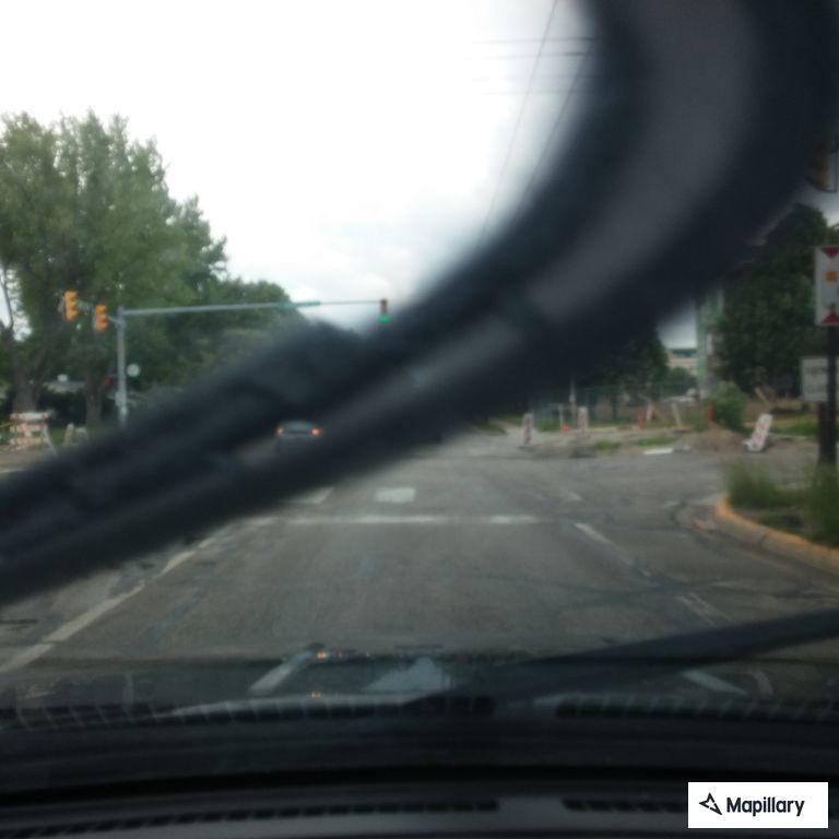 Two-vehicle crash with airbags and vehicle smoking