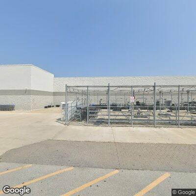 Male found lying partially on cart and ground at Walmart