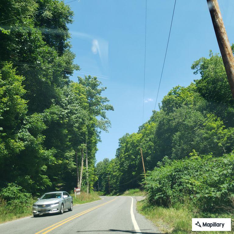 Vehicle disabled after hitting rock on Toms Run Road