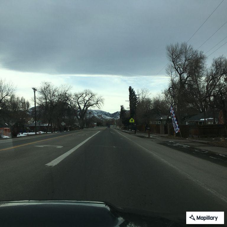 Patient in white van with hazard lights on at Overland Trail