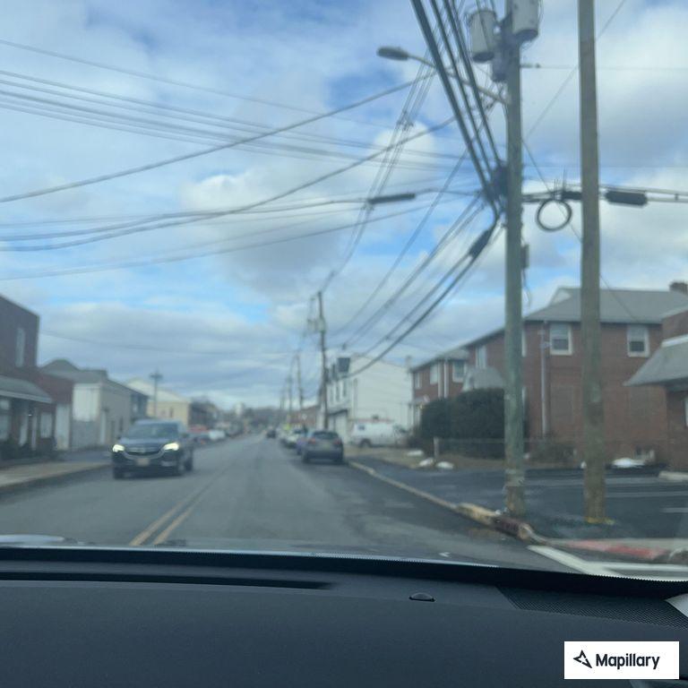 Officers check report of low wire on South 21st Street