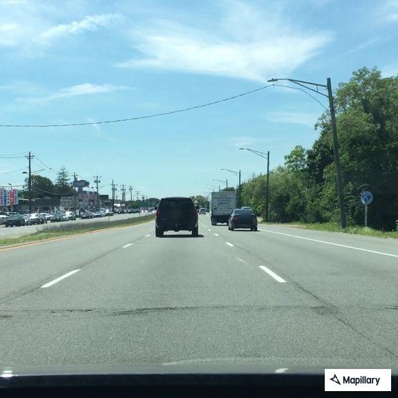 Two-car crash with smoking vehicle on Sunrise Highway