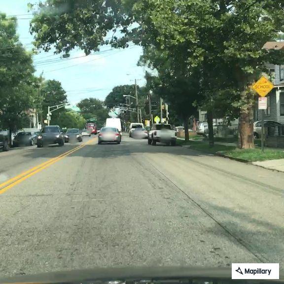 Highway unit towing car from North Avenue lot