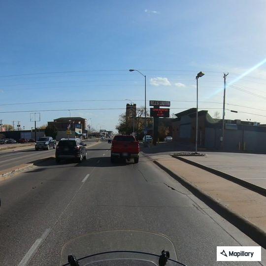Gray SUV runs red light at East 25th and 2nd Avenue