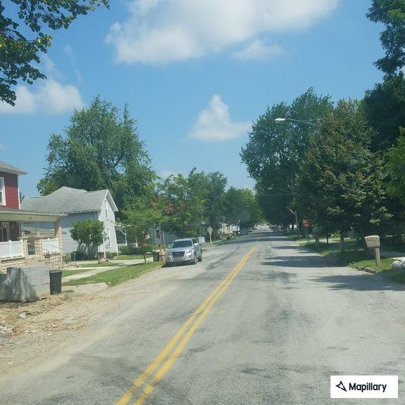 Driver reports collision and stops in roadway