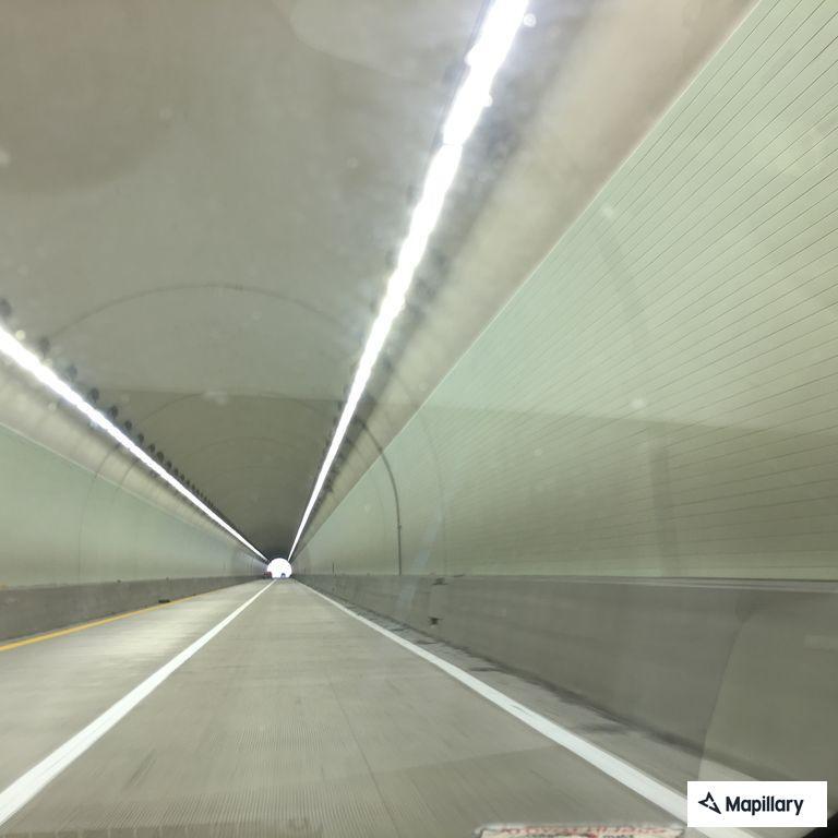 Semi driving wrong way on highway near tunnels
