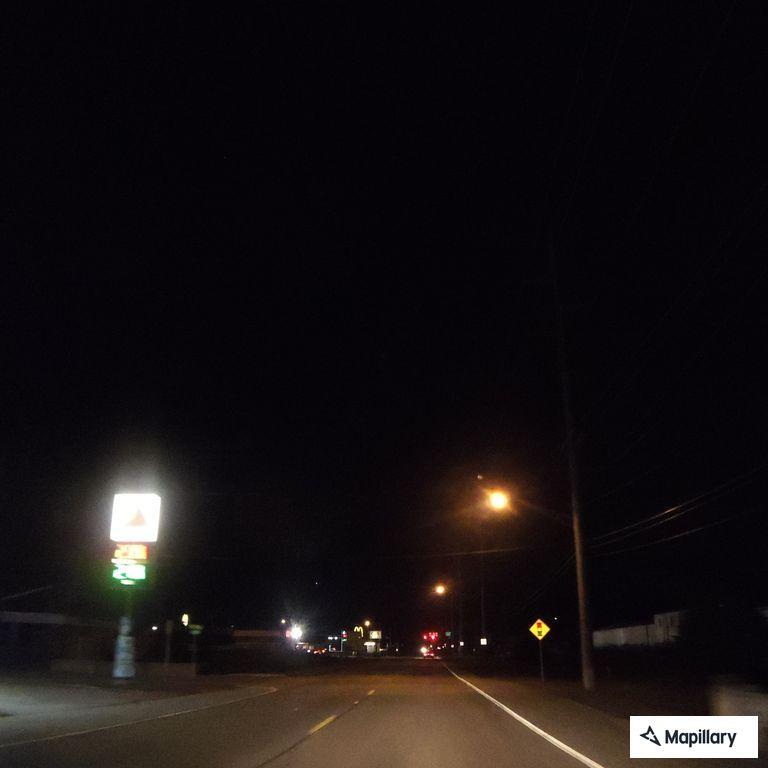 Person reported staying in trees near gas station