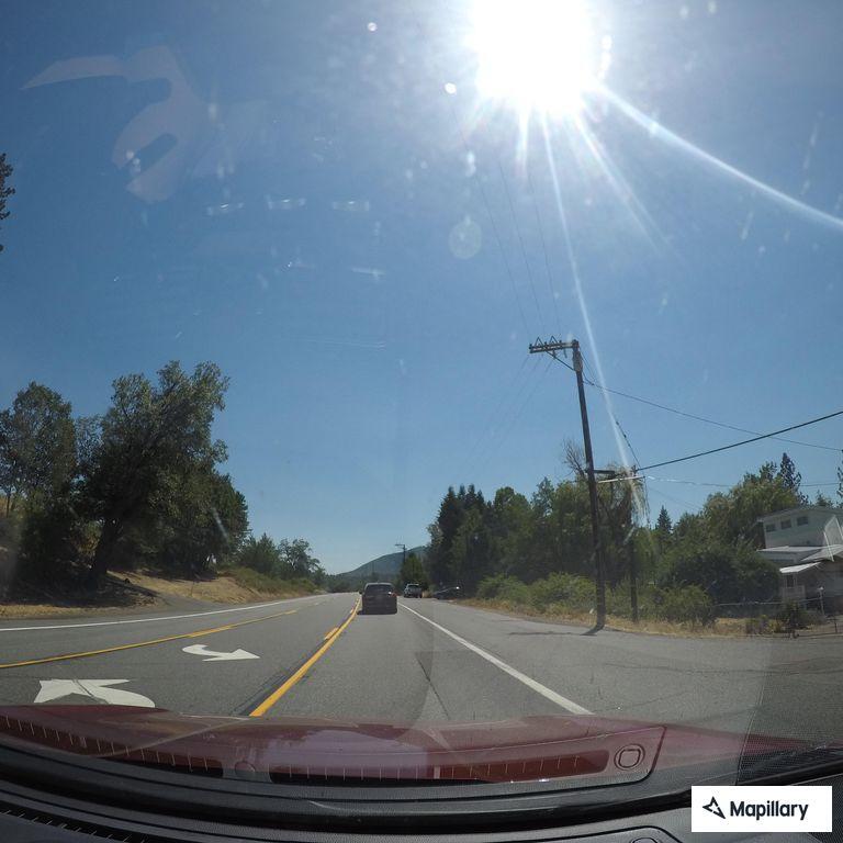 Motorcyclist and car swerve off Highway 299