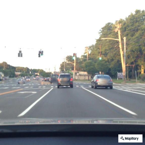 Homeless woman near roadway on Nichols Road