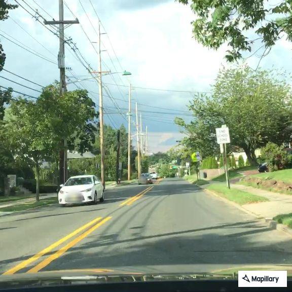 Disabled car blocking lanes on Maywood Avenue