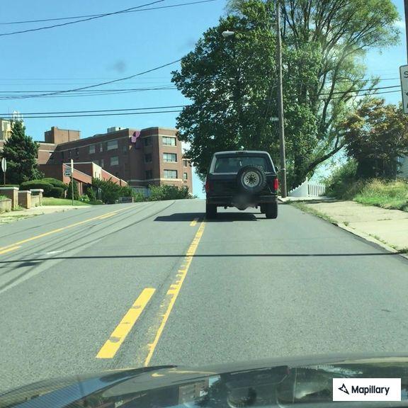 Tractor trailer hits pole, wires down on roadway