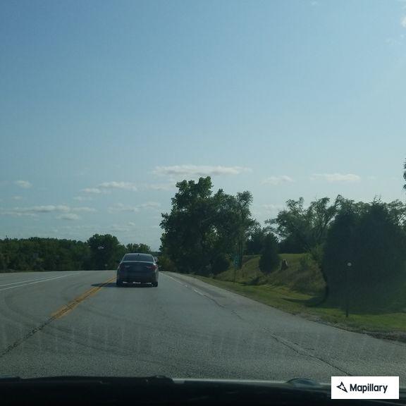 Male having seizure in roadway at West Eighth Avenue