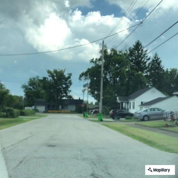 Person with general illness on highway in Barberton, OH