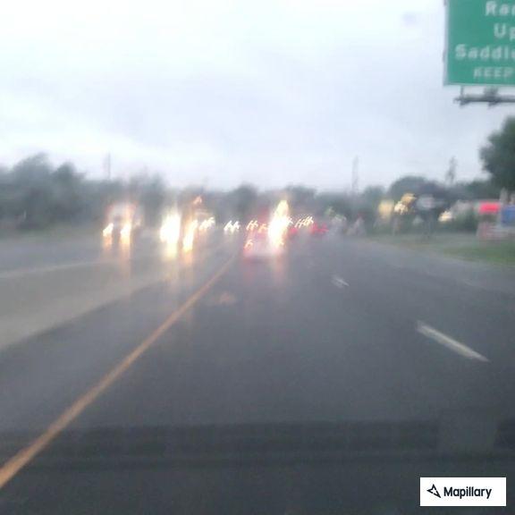 Pedestrian walking against traffic on Route 17