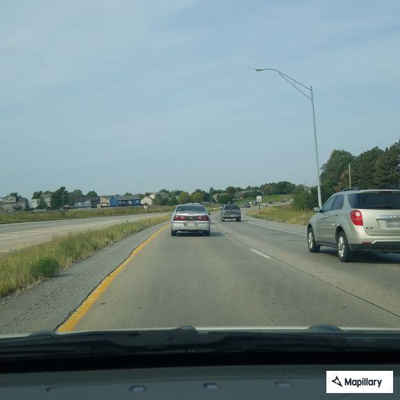 Traffic stop on gray sedan on Highway 370