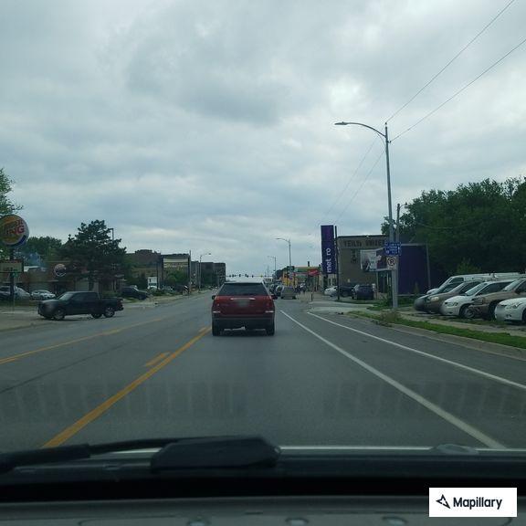 People drinking outside gas station refuse to leave