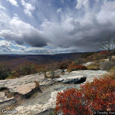 Person experiencing chest pain at Bear Mountain tower
