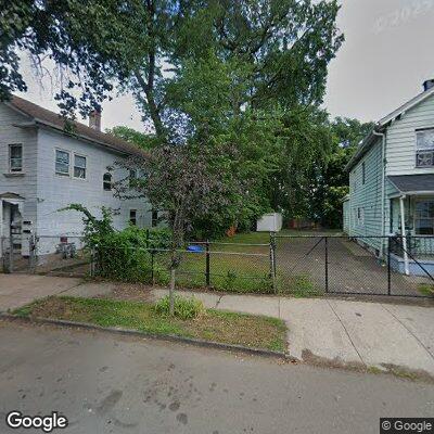 Woman urinating on green near Monroe Street