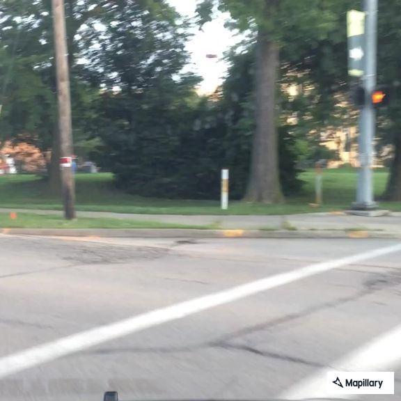 Erratic gray SUV speeding on Valley Parkway