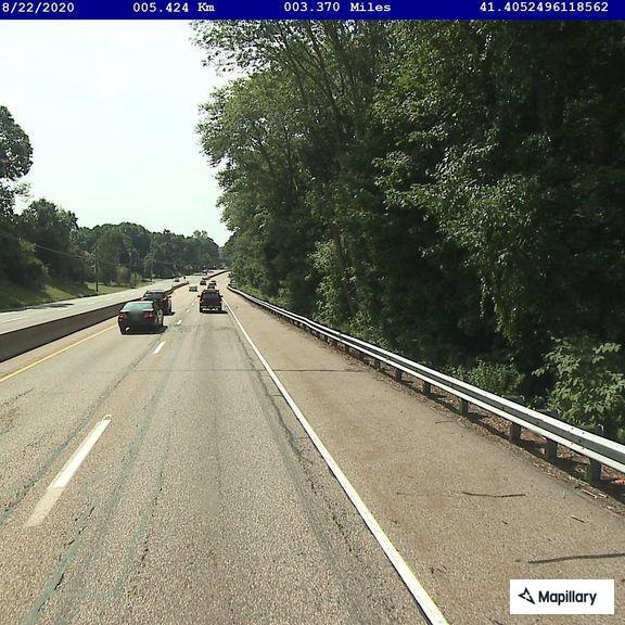 Two vehicles racing northbound on I-395