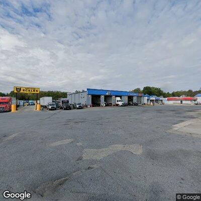 Truck and van in property damage crash at shop