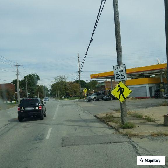 Unit blocking part of eastbound lane due to low-hanging wires after pole incident.