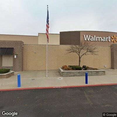 Woman feeling dizzy with headache and nausea at Walmart