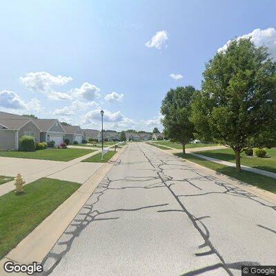 Person experiencing back pain on Birchwood Drive