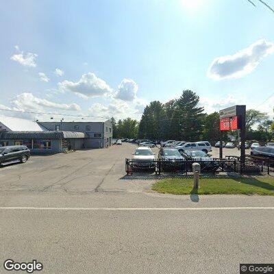 Police standby at auto dealer for item pickup