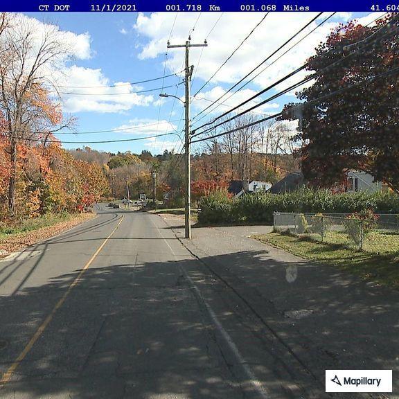 Minor crash with fluid leak on Beach Road