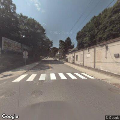 Woman pacing in roadway on Bridge Street