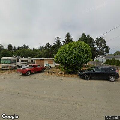 Unknown man cutting tree at vacant residence