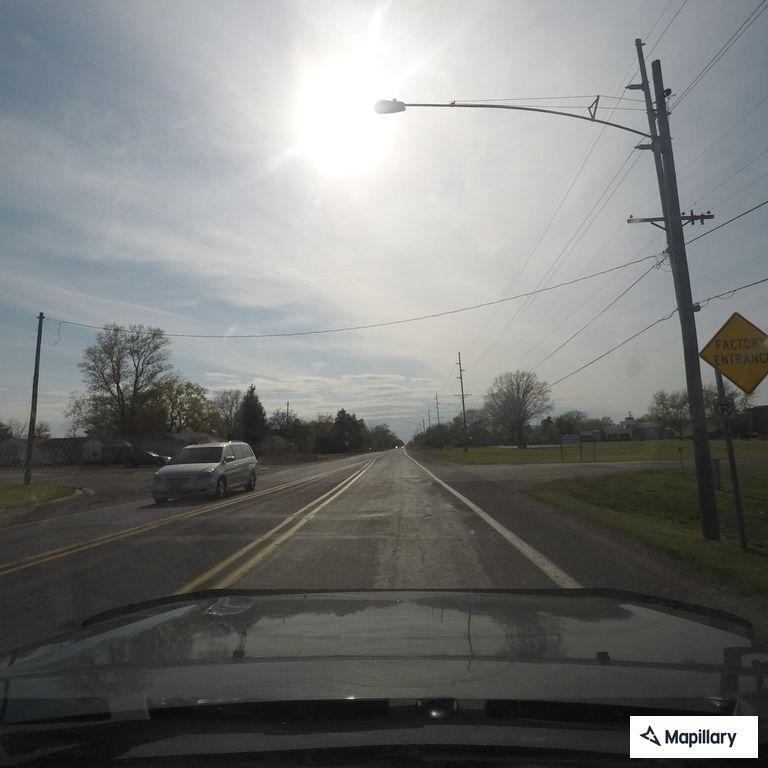 Two-car crash with neck and head injuries on US-12