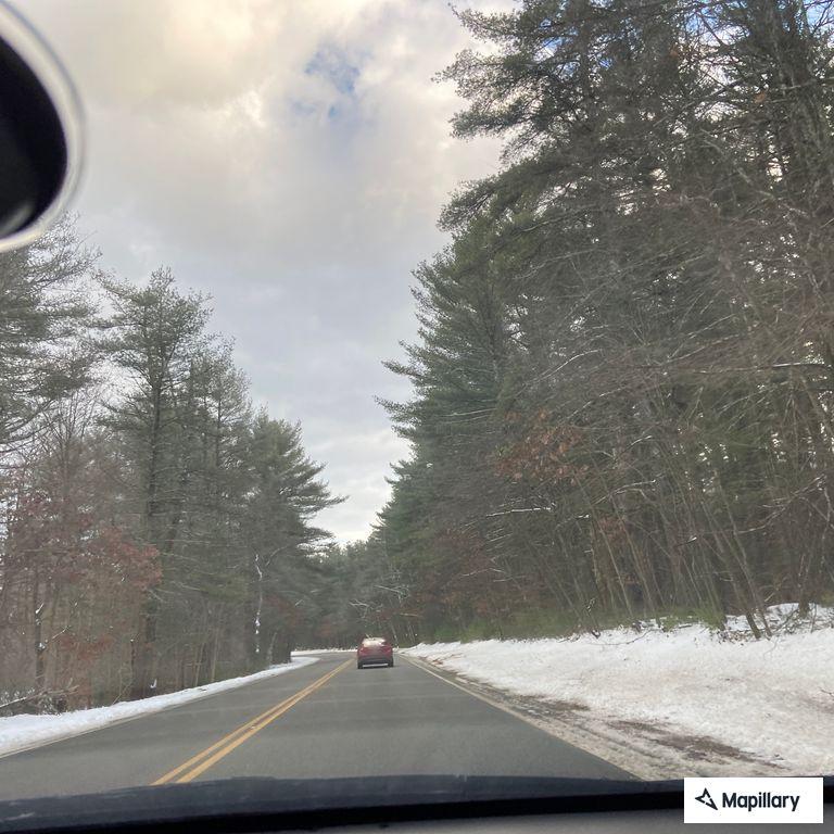 Car off roadway near Walpole Hill
