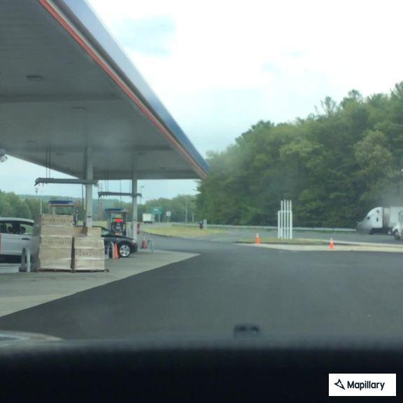 Brush fire near Ludlow Plaza affecting traffic lanes