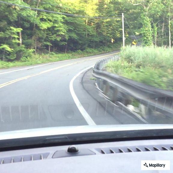 Tree and utility poles block Route 23 in Blandford