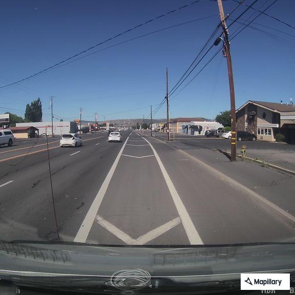 Burglary suspect reported in white SUV on South Sixth
