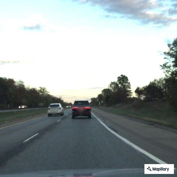 Prisoner with back pain and nausea on I-94 on-ramp