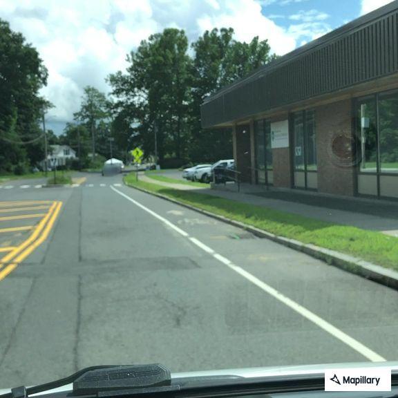 Erratic driving by pickup truck near Pleasant Street