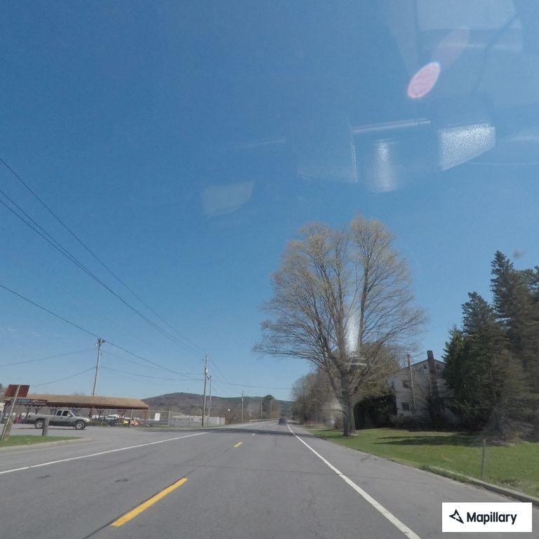 Erratic gray sedan driving slowly on Route 20