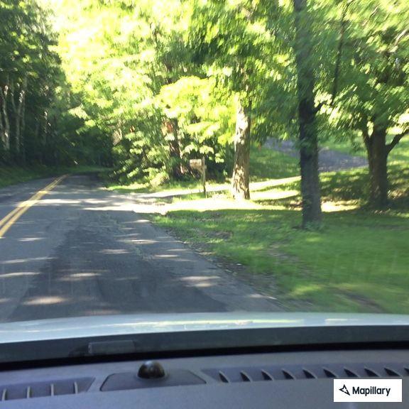 Vehicle rollover in woods near Old Cheshire Road