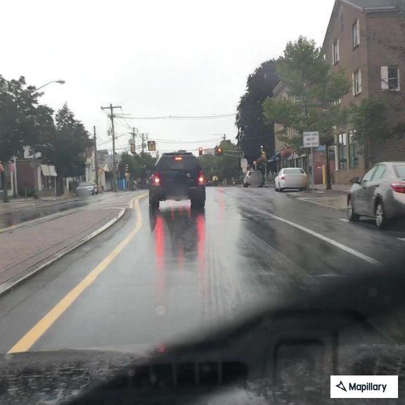 Disabled vehicle with flat tire at Walgreens lot