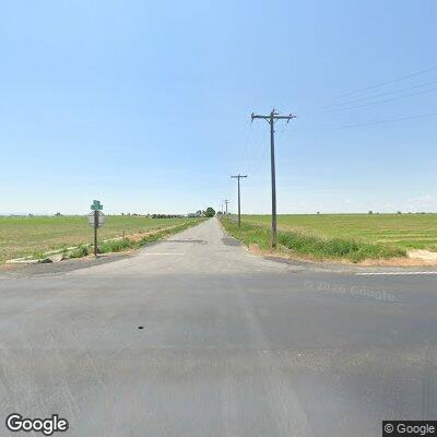 Downed stop sign at rural intersection