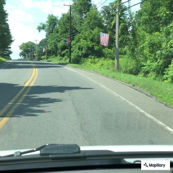 Officer gives hitchhiker a ride to Shell station